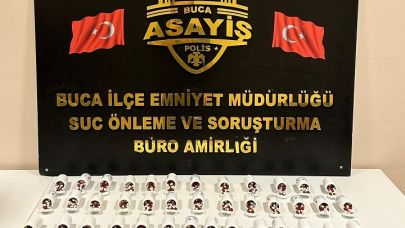 Buca’da evde 2 bin 246 sentetik ecza ele geçirildi